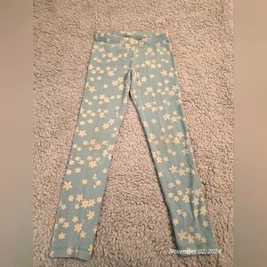Cat & Jack floral leggings, girl's size 6, warm tone light blue with daisy print